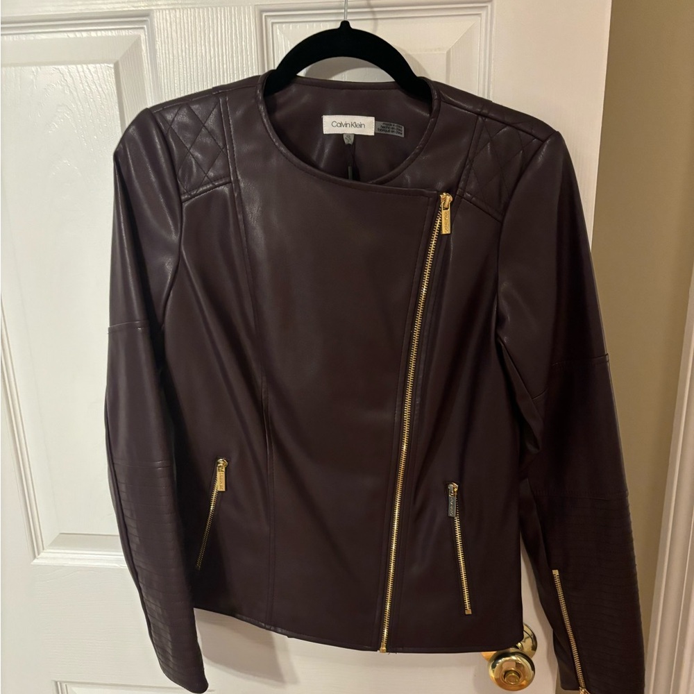 Calvin Klein Burgundy, NWT never worn vegan leather jacket